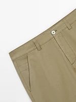 Trousers with side pocket detail