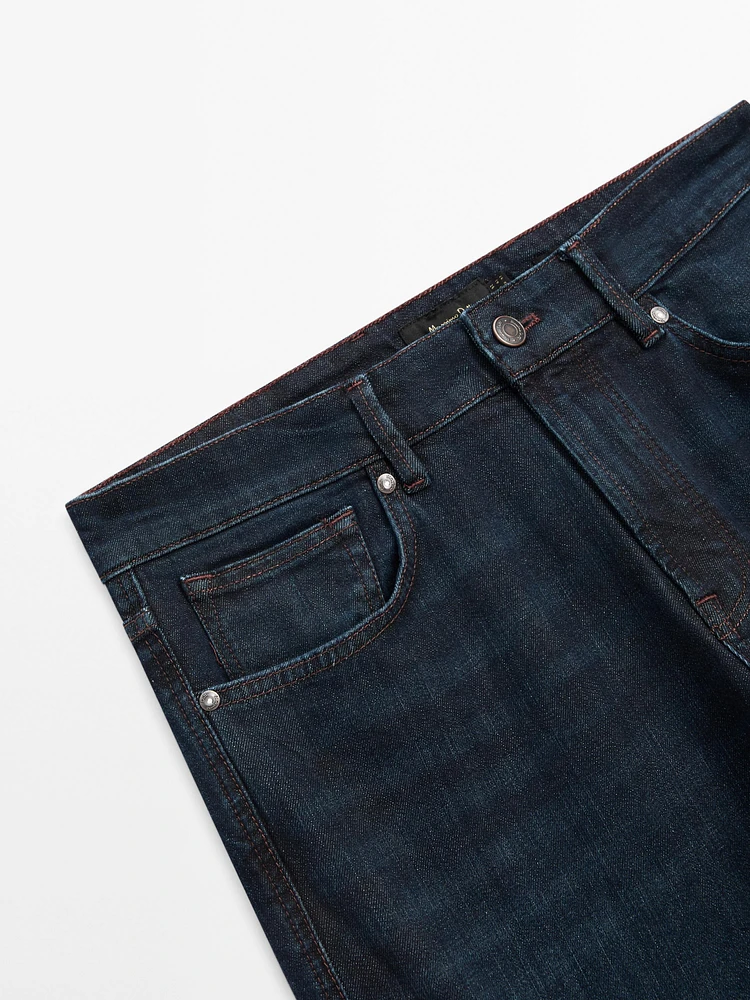 Tapered fit enzymatic jeans