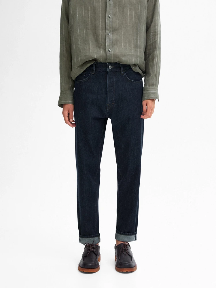 Cotton blend tapered fit selvedge jeans