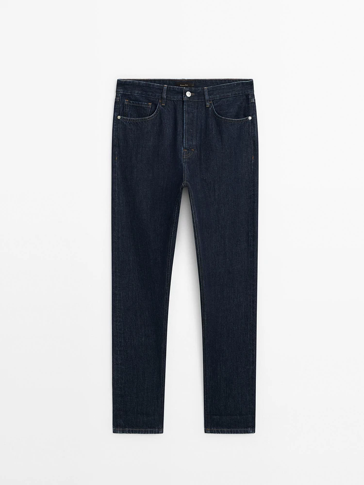 Cotton blend tapered fit selvedge jeans