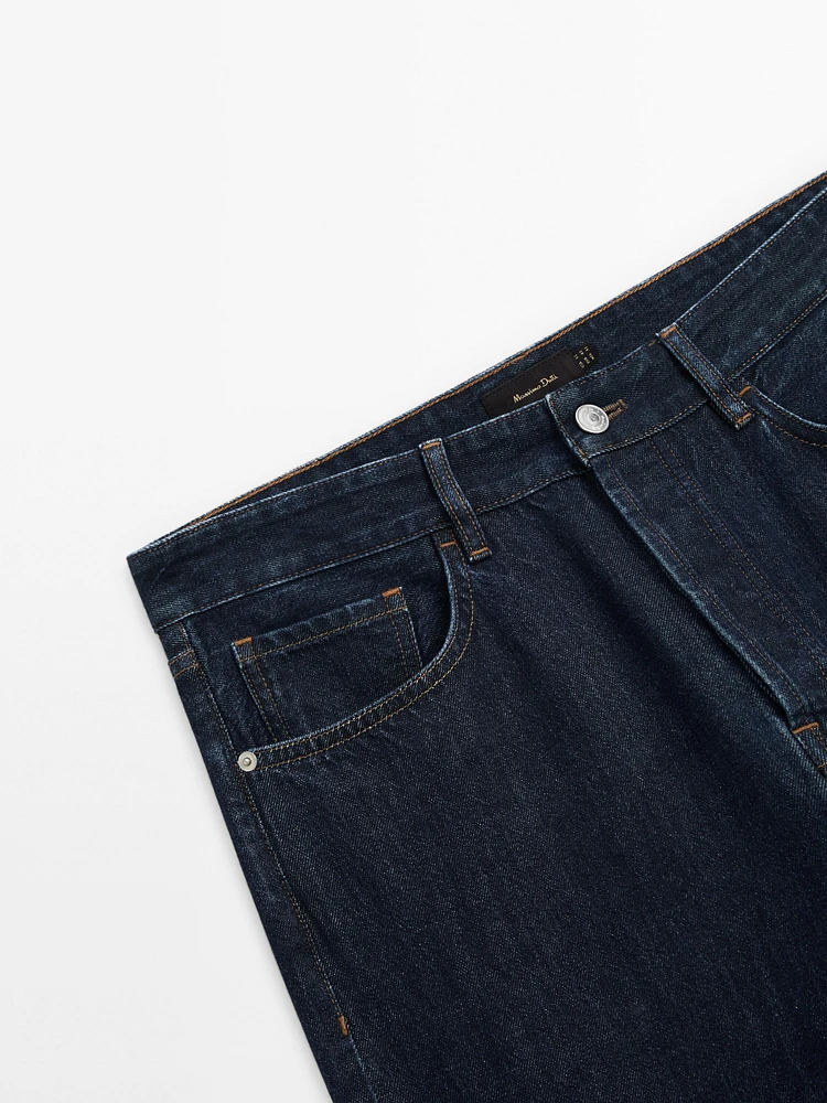 Cotton blend tapered fit selvedge jeans