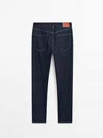 Cotton blend tapered fit jeans