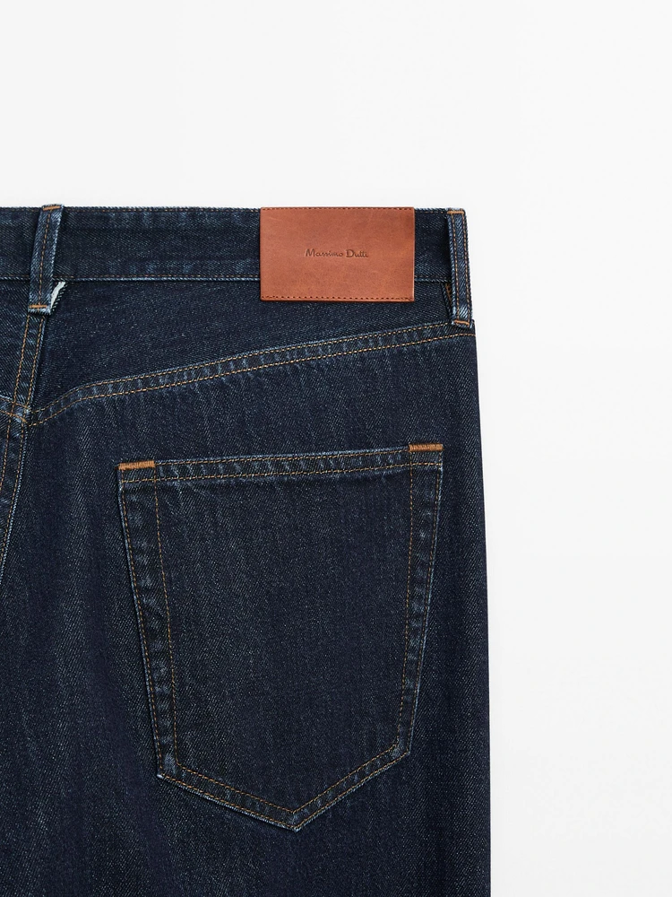 Cotton blend tapered fit selvedge jeans