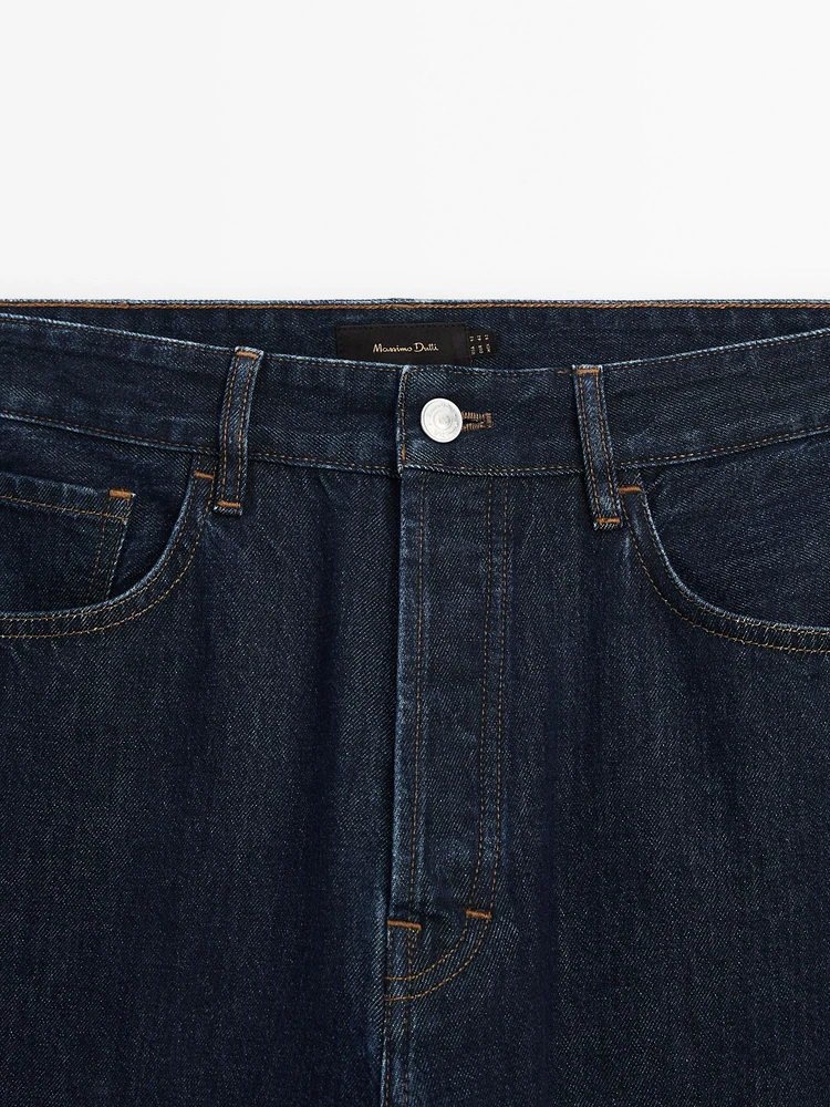 Cotton blend tapered fit selvedge jeans