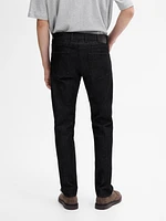 Tapered-fit denim-effect trousers