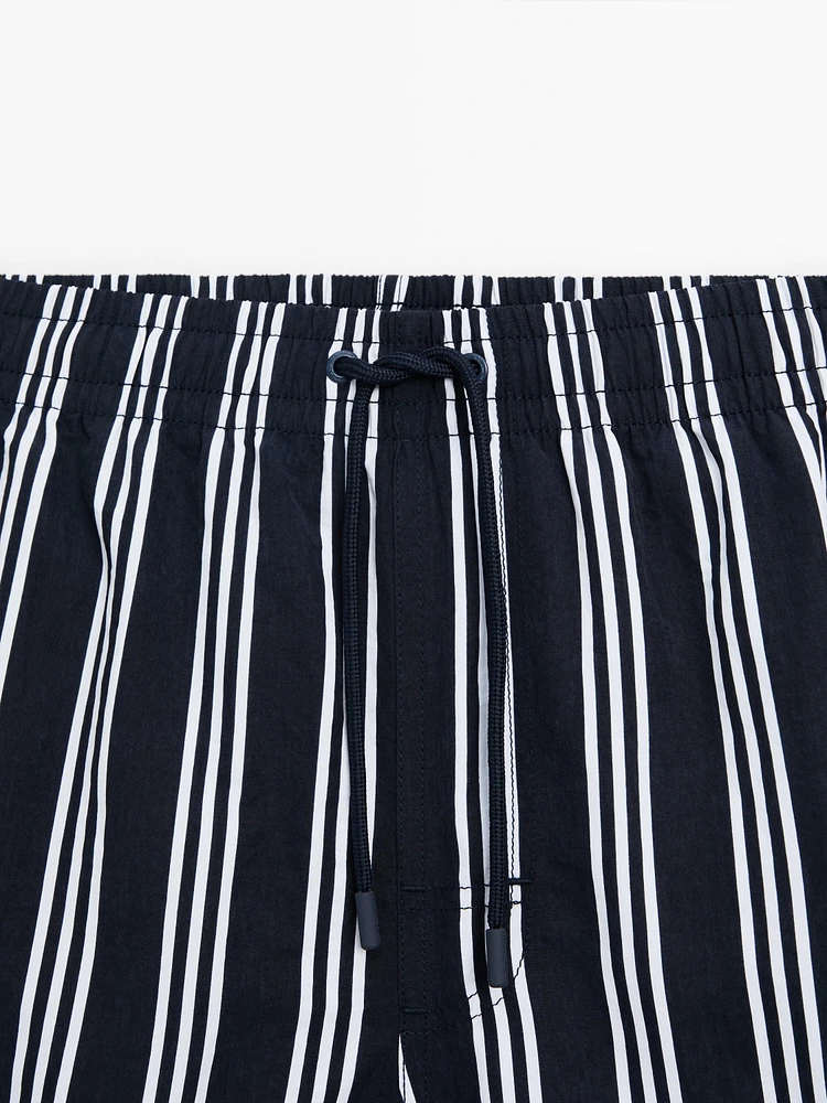 Striped swimming trunks