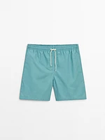 Plain pigment swimming trunks