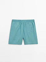 Plain pigment swimming trunks