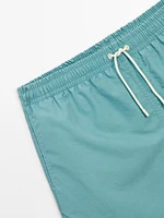 Plain pigment swimming trunks