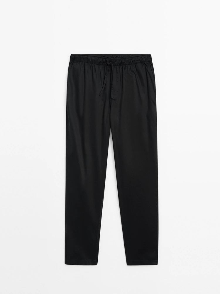 Satin pyjamas with long trousers and a short sleeve T-shirt