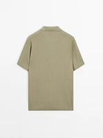 Knit polo shirt with fabric detail