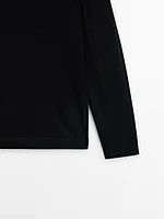 100% merino wool sweater with zip detail