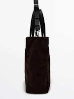 Split leather and leather bag with straps