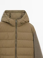 Puffer jacket with contrast knit detail