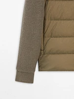 Puffer jacket with contrast knit detail