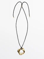 Leather cord necklace with asymmetric piece