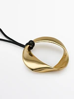 Leather cord necklace with asymmetric piece