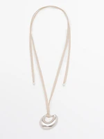 Adjustable cord necklace with abstract piece