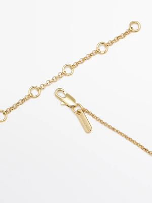 Chain necklace with textured droplet