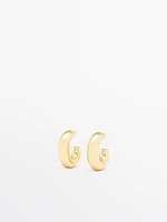 Curved hoop earrings