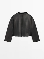 Reversible voluminous hair on leather coat