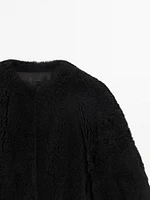 Reversible voluminous hair on leather coat