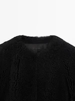 Reversible voluminous hair on leather coat