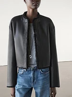 Reversible voluminous hair on leather coat