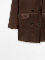 Crossover shearling coat