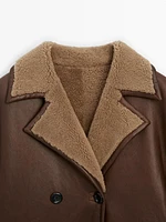 Crossover shearling coat