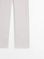 High-waist jeans with fabric detail