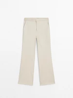 Waxed flare fit cropped trousers