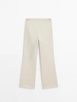 Waxed flare fit cropped trousers