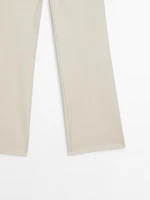 Waxed flare fit cropped trousers