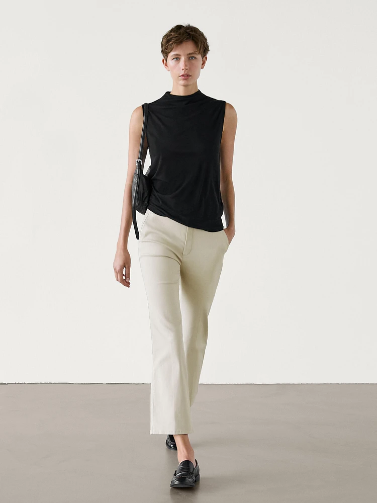 Waxed flare fit cropped trousers