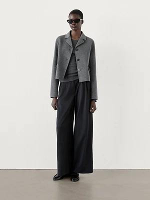 Wide-leg flowing trousers with darts