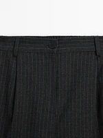 Darted pinstripe trousers