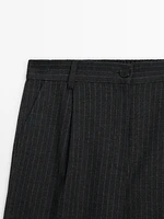 Darted pinstripe trousers