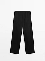 Straight-leg satin trousers with an elastic waistband