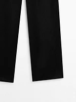 Straight-leg satin trousers with an elastic waistband