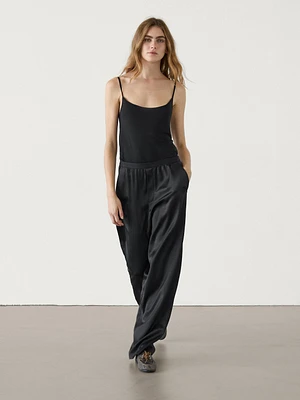 Straight-leg satin trousers with an elastic waistband