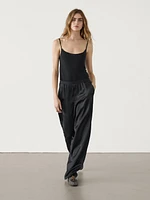 Straight-leg satin trousers with an elastic waistband