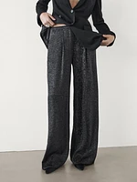 Shimmery pleated trousers