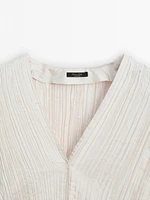 Top with pleated detail