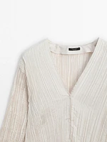 Top with pleated detail