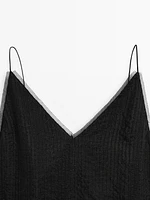 Camisole top with semi-sheer detail