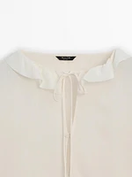 Shirt with ruffled sleeves