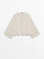 Shirt with ruffled sleeves