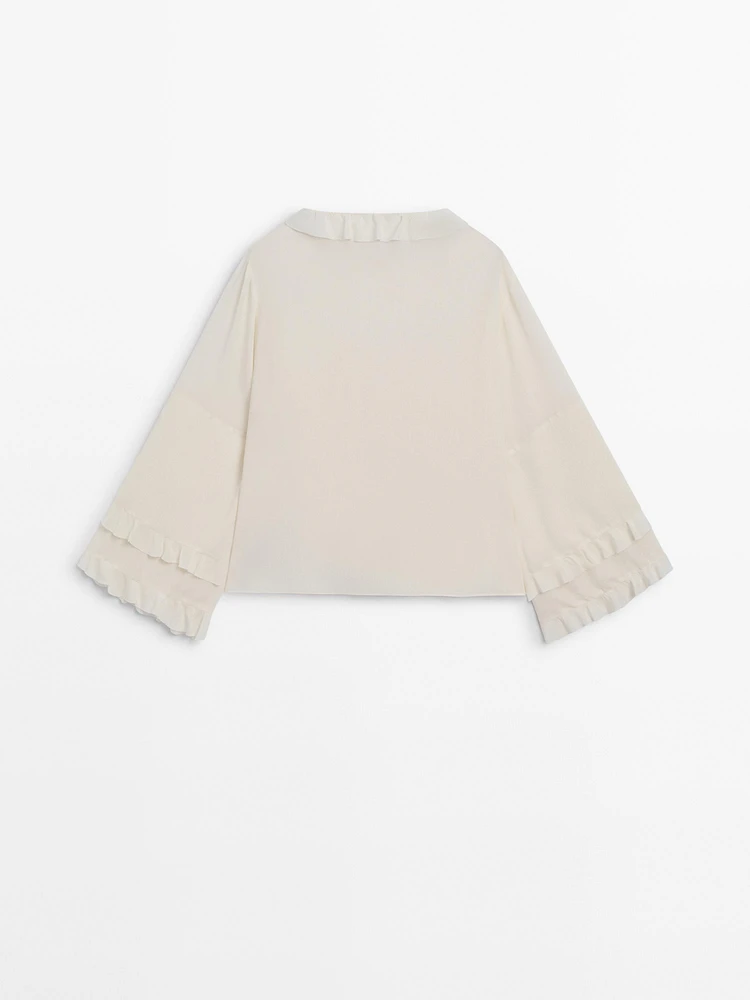 Shirt with ruffled sleeves