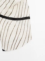 Stripe print top with asymmetric neckline